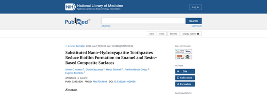 Substituted Nano-Hydroxyapatite Toothpastes Reduce Biofilm Formation on Enamel and Resin-Based Composite Surfaces